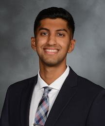 A headshot of Shray Parimoo